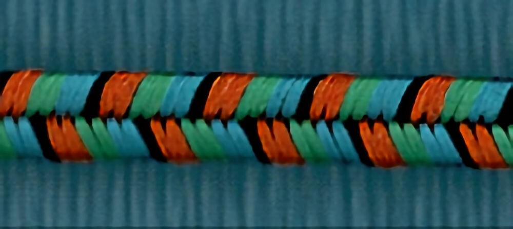 57-166.jpg 5 Yards 1/8" Orange, Teal, Green, Black Double Alternating Trim 4197 - Image 1