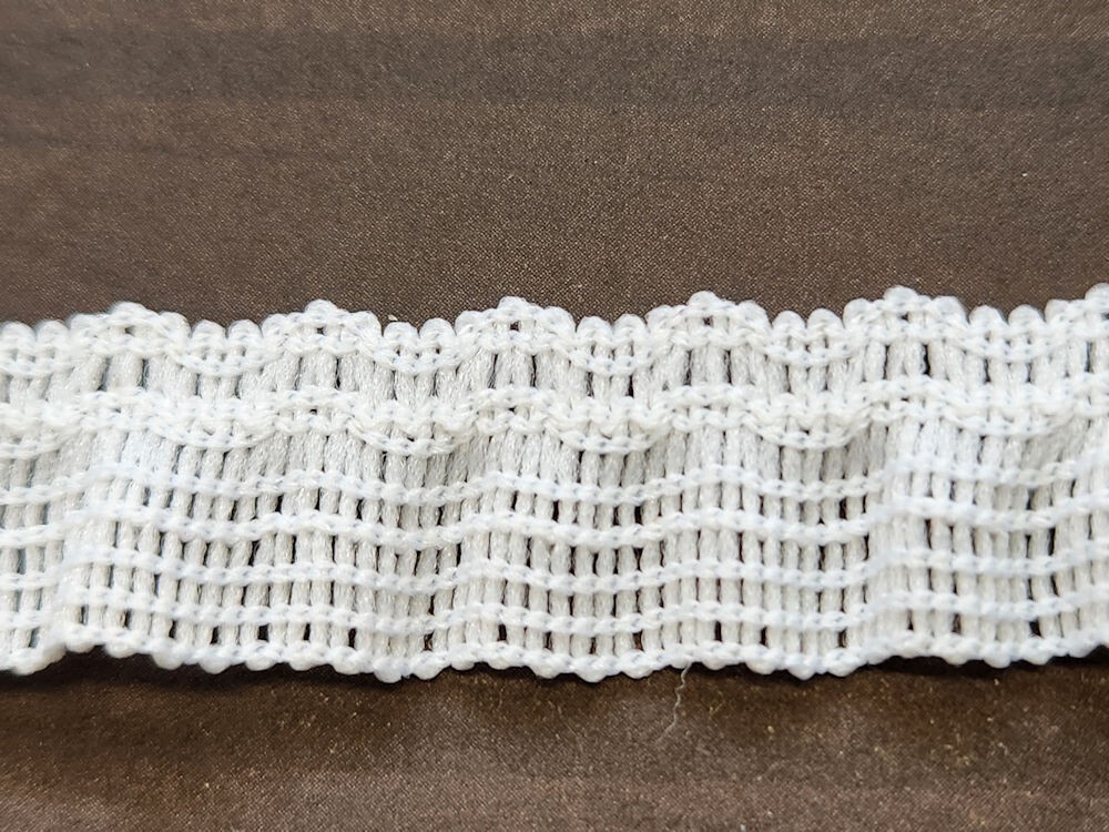 57-691.jpg 5 Yards 5/8" White Elastic Gathered Curtain Looking Trim 47188 - Image 1
